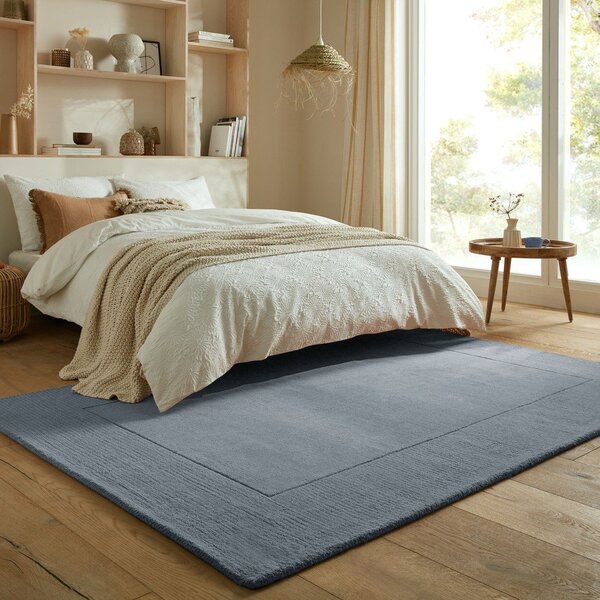 Tmavě modrý ručně tkaný vlněný koberec 120x170 cm Textured Wool Border – Flair Rugs