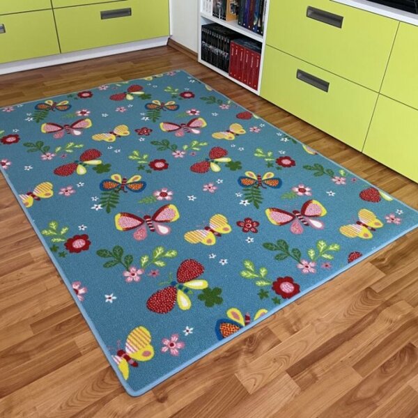 Dětský koberec Motýlek 5271 modrý 1 m2 Motýlek 5271 modrý BEZ OBŠITÍ 1 m2 Motýlek 5271 modrý BEZ OBŠITÍ