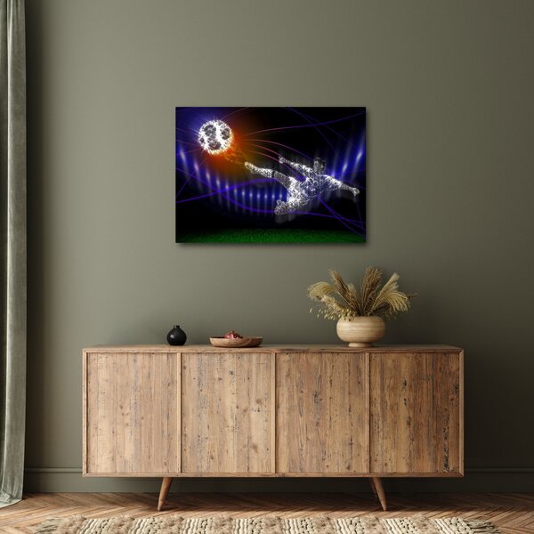 Obraz fotbalisty ve skoku (70x50 cm)