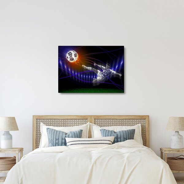 Obraz fotbalisty ve skoku (70x50 cm)