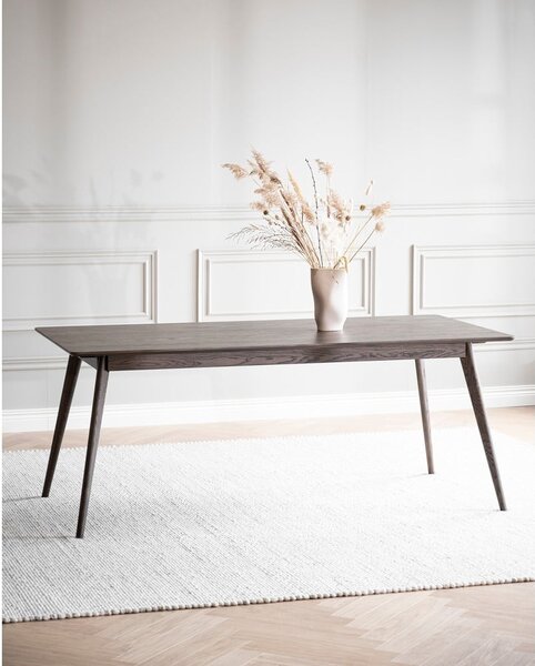 Tmavě hnědý rozkládací jídelní stůl v dekoru dubu 90x190 cm Yumi – Rowico