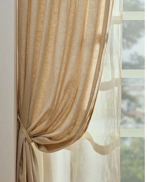 Béžový bavlněný závěs 140x270 cm Nolira – Kave Home