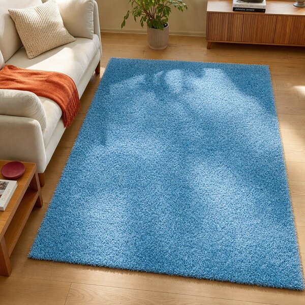 Modrý koberec Universal Aqua Liso, 57 x 110 cm