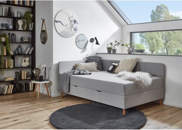 Světle šedá čalouněná jednolůžková postel s úložným prostorem 90x200 cm Cabana – Meise Möbel