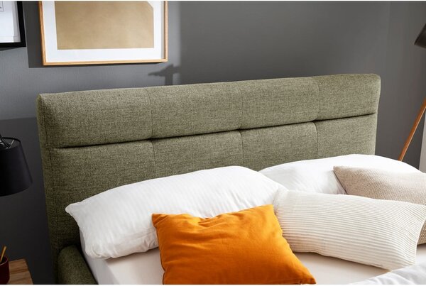 Zelená čalouněná dvoulůžková postel s úložným prostorem s roštem 140x200 cm Lotte – Meise Möbel