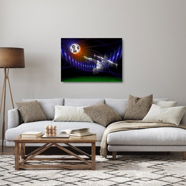 Skleněný obraz fotbalisty ve skoku (70x50 cm)
