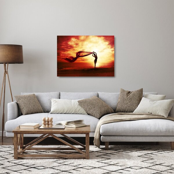 Skleněný obraz - Silueta ženy v západu slunce (70x50 cm)