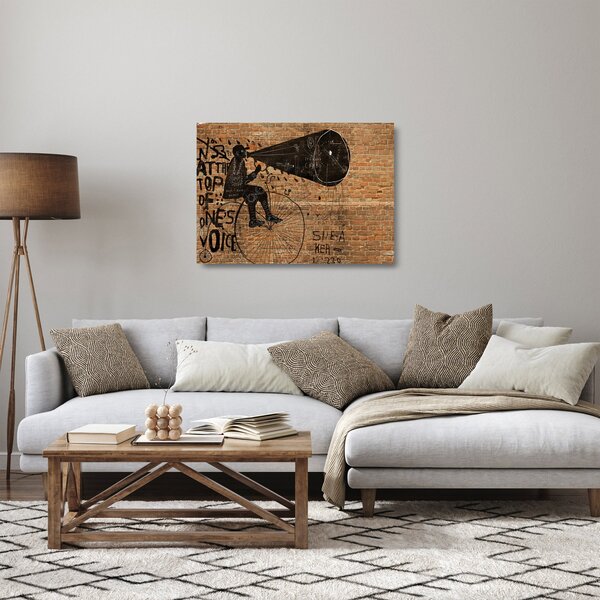 Skleněný obraz - Muž na kole v Banksyho stylu (70x50 cm)