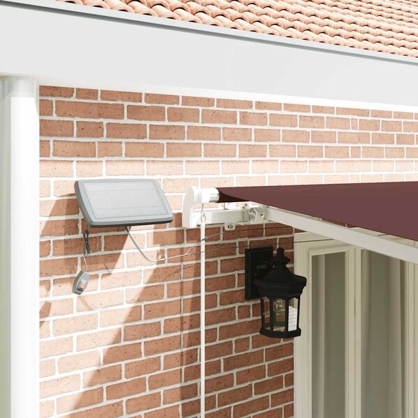 Ručně zatahovací markýza s LED hnědá 600 x 300 cm 3215385