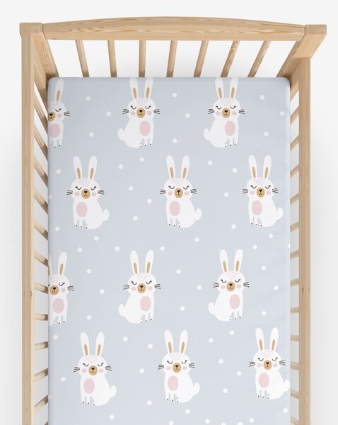 Goldea bavlněné napínací prostěradlo do dětské postýlky - zasnění králíčci 60 x 120 cm
