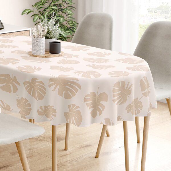 Goldea oválný ubrus 100% bavlněné plátno - tropické listy na béžovém 140 x 240 cm