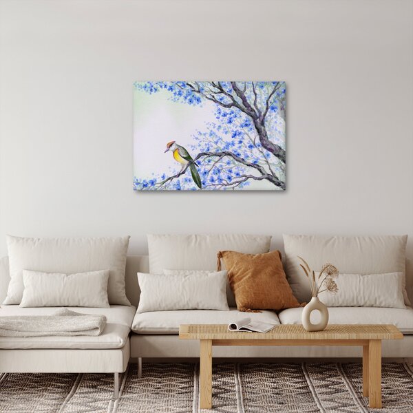 Obraz - Ptáček na stromě s modrými květy (70x50 cm)