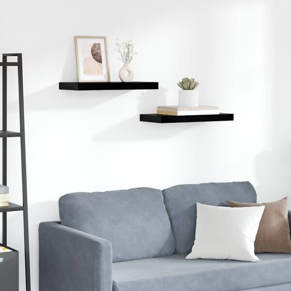 Plovoucí nástěnné police 2 ks lesklé černé 50 x 23,5 x 3,8 cm MDF 323767