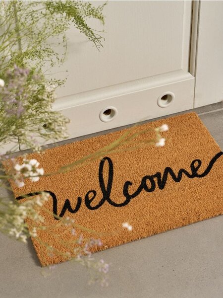 Sinsay - Rohožka s nápisem Welcome - krémová