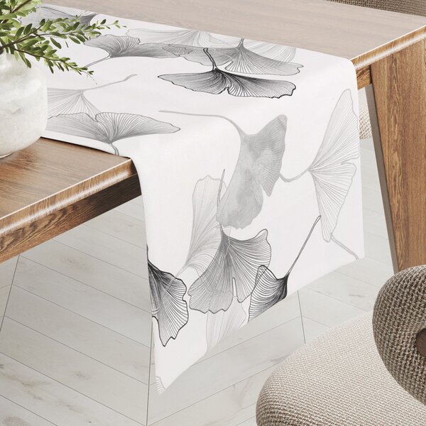 Biante Bavlněný běhoun na stůl Sandra SA-512 Šedo-bílé ginkgo listy na bílém 20x120 cm
