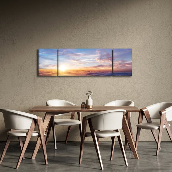 Obraz - Západ slunce nad mraky (170x50 cm)