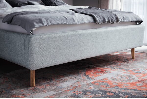 Šedomodrá čalouněná dvoulůžková postel s úložným prostorem s roštem 180x200 cm Lotte – Meise Möbel