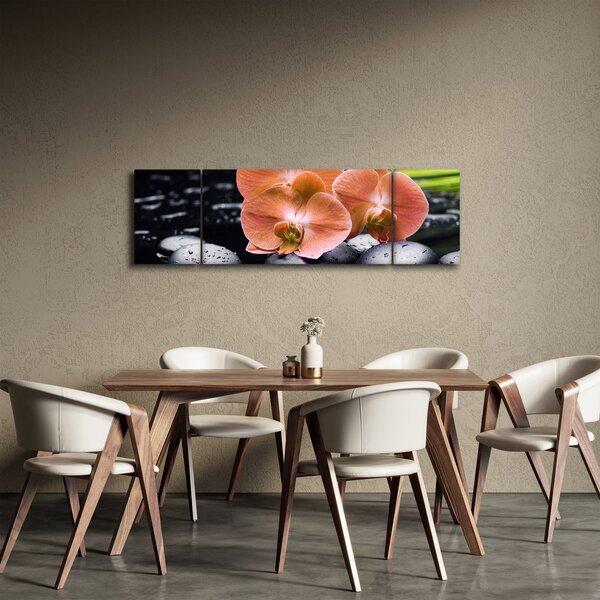 Obraz - Oranžová orchidej s palmovými listy (170x50 cm)