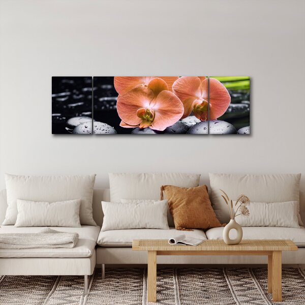 Obraz - Oranžová orchidej s palmovými listy (170x50 cm)