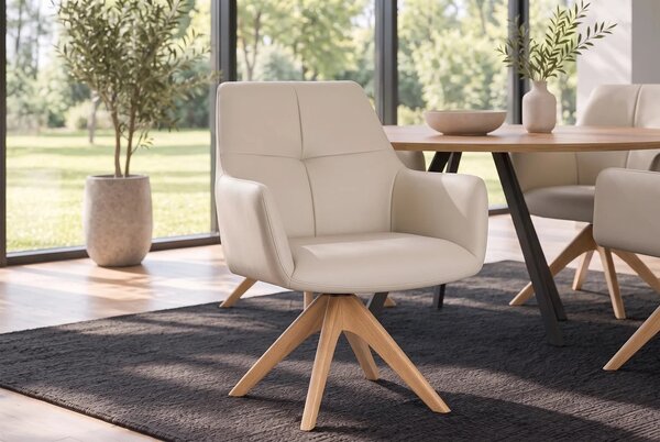 Luxusní designová béžová otočná jídelní židle Elton s potahem z pravé kůže a masivním hnědým dubovým nohama 62 cm