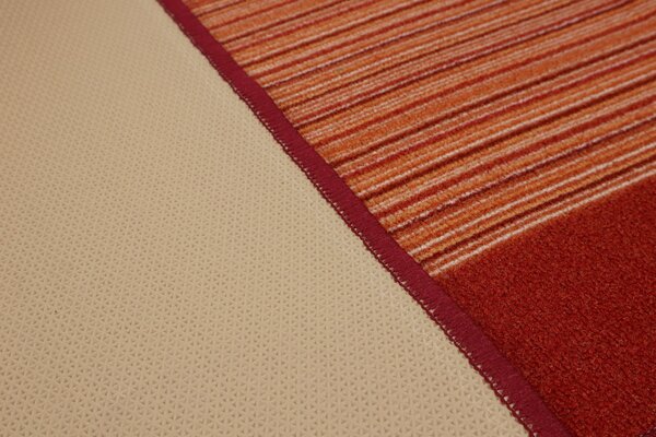 Associated Weavers, Protiskluzový běhoun na míru Carnaby 84, šíře 67 cm, červená, chodba / předsíň