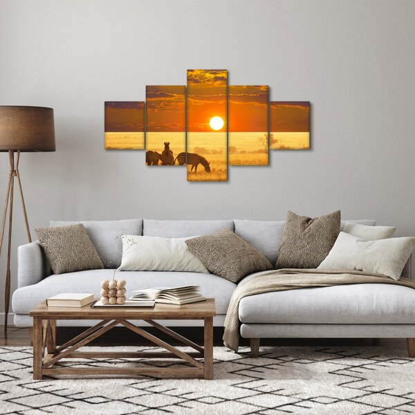 Obraz - Zebry se západem slunce (125x70 cm)