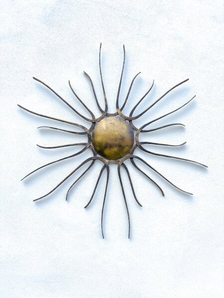 Kovové slunce - nástěnná dekorace