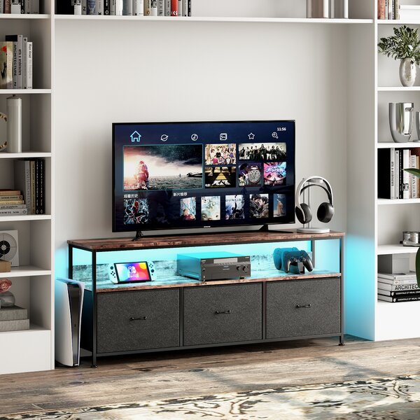 Multifunkční nábytek komoda, TV komoda v barvě tygří kůže s černými látkovými zásuvkami, LED osvětlením, úložným toaletním stolkem a úložnou kuchyňskou skříňkou