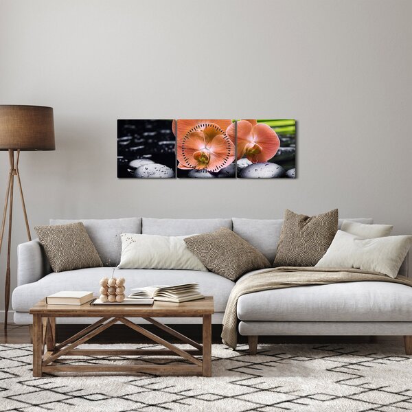Obraz - Oranžová orchidej s palmovými listy (s hodinami) (90x30 cm)