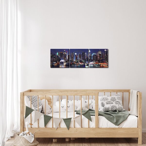 Obraz - Osvětlené New Yorské mrakodrapy (s hodinami) (90x30 cm)