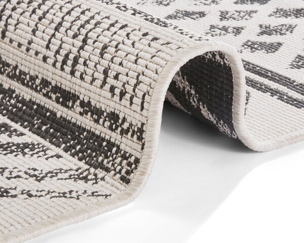 Černo-krémový venkovní koberec NORTHRUGS Biri, 80 x 350 cm