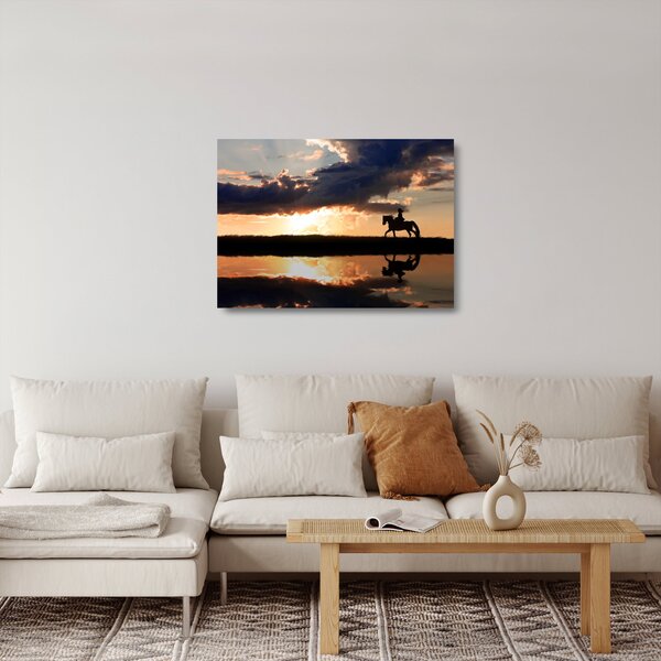 Skleněný obraz - Jezdec na koni při západu slunce (70x50 cm)
