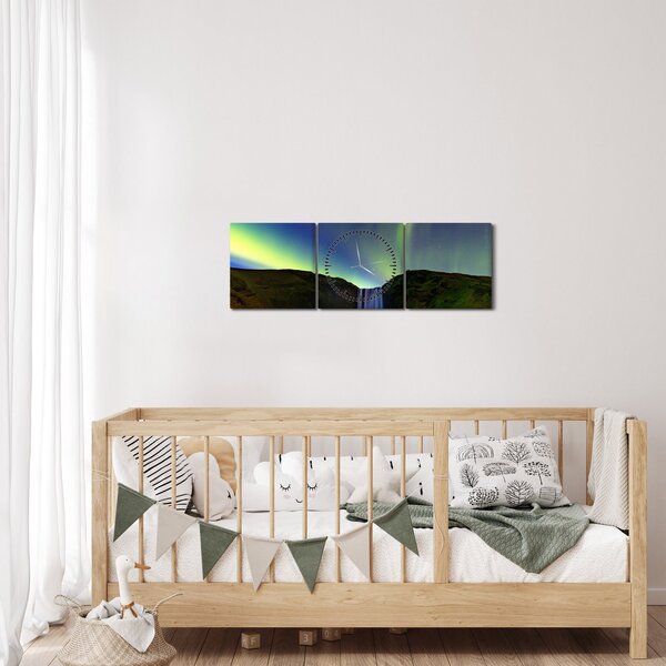 Obraz - Polární záře na Islandu (s hodinami) (90x30 cm)