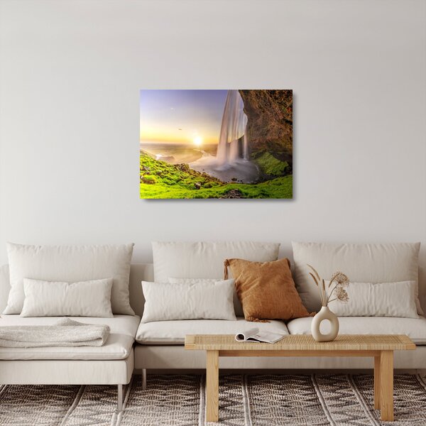 Skleněný obraz - Seljalandsfoss zpoza nitra jeskyně (70x50 cm)
