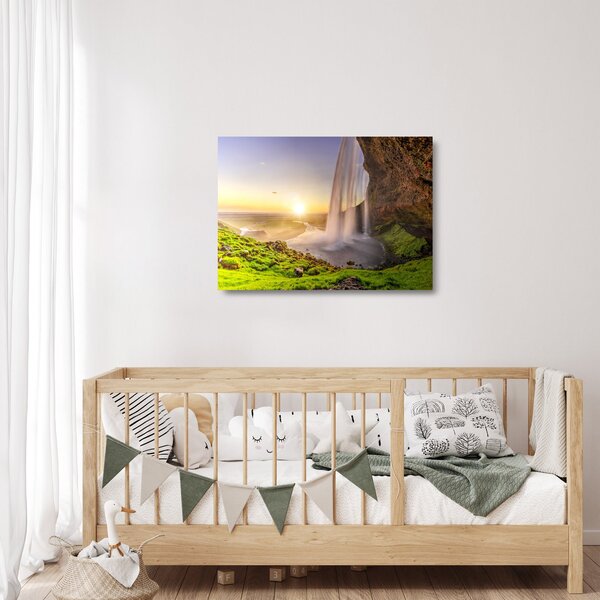 Skleněný obraz - Seljalandsfoss zpoza nitra jeskyně (70x50 cm)