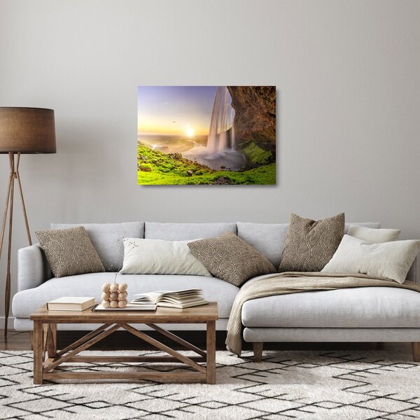 Skleněný obraz - Seljalandsfoss zpoza nitra jeskyně (70x50 cm)