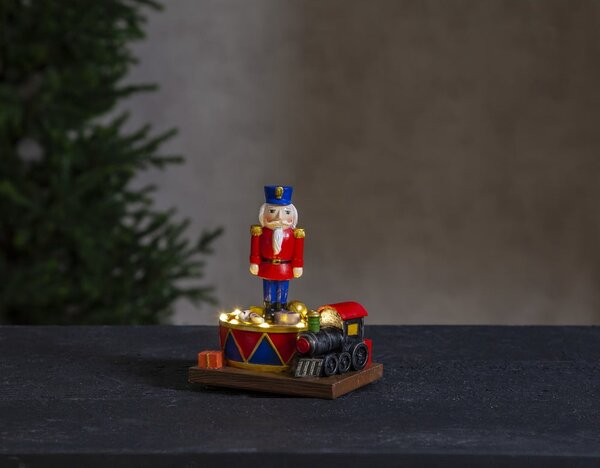 Vánoční světelná LED dekorace Star Trading Nutcracker, výška 16 cm