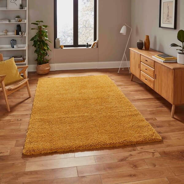 Hořčicově žlutý koberec Think Rugs Sierra, 80 x 150 cm