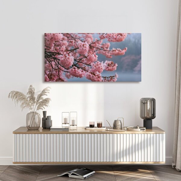 Obraz rozkvetlá sakura nad klidnou vodou