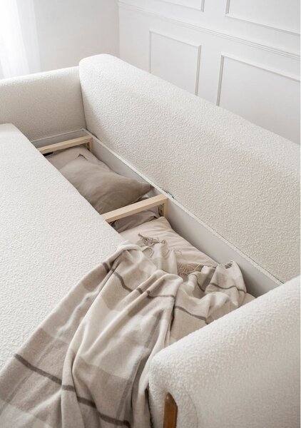 Slonovinová rozkládací/s úložným prostorem pohovka z textilie bouclé 244 cm Arcadova – ELTAP
