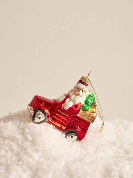 Sinsay - Skleněná vánoční ozdoba ve tvaru Santy v autě - vícebarevná