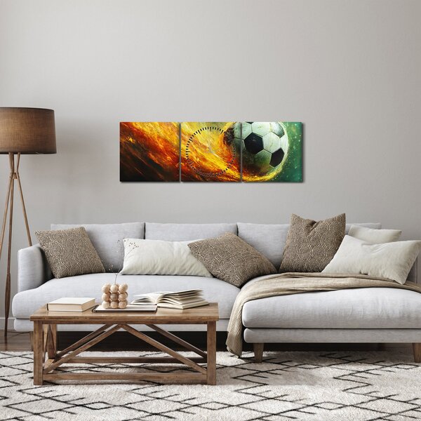 Obraz - Fotbalový míč v letu (s hodinami) (90x30 cm)