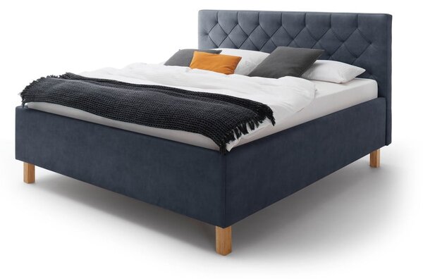Tmavě modrá čalouněná dvoulůžková postel s úložným prostorem s roštem 180x200 cm San Remo – Meise Möbel