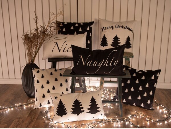 Černo-bílý vánoční povlak na polštář s nápisem This House believes in Santa – 30x50 cm