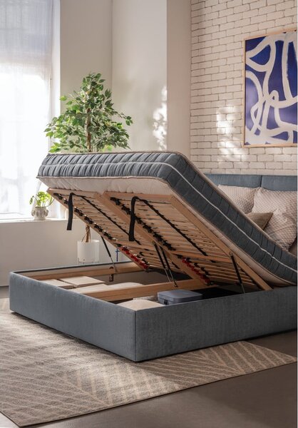 Modrá čalouněná dvoulůžková postel s úložným prostorem s roštem 180x200 cm Thessa Bold – Bonami Selection