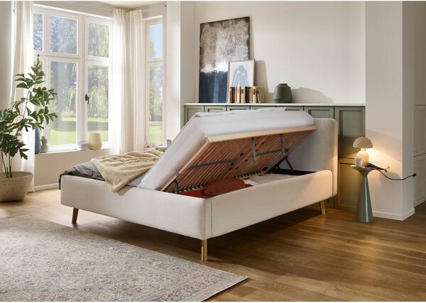 Krémová čalouněná dvoulůžková postel s úložným prostorem s roštem 180x200 cm Mattis – Meise Möbel
