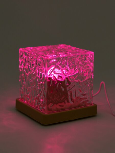 Sinsay - RGB LED dekorativní stolní lampa ve tvaru kostky s efektem tekoucí vody - clear