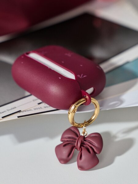 Sinsay - Pouzdro na AirPods Pro 2. generace s motivem mašle - kaštanová