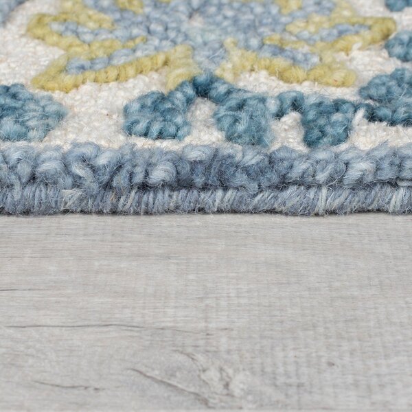 Modrý/slonovinový ručně tkaný koberec s příměsí vlny 160x230 cm Myla Floral Frame – Flair Rugs